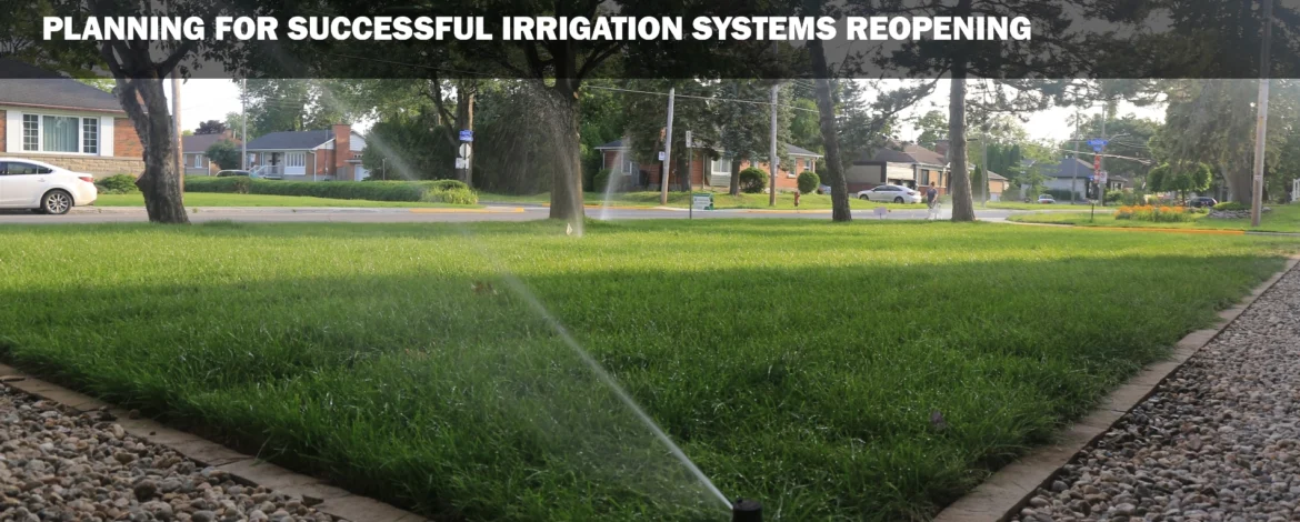 A photo is shown of a large garden being watered by sprinklers. ideal for the Irrigation Systems Reopening