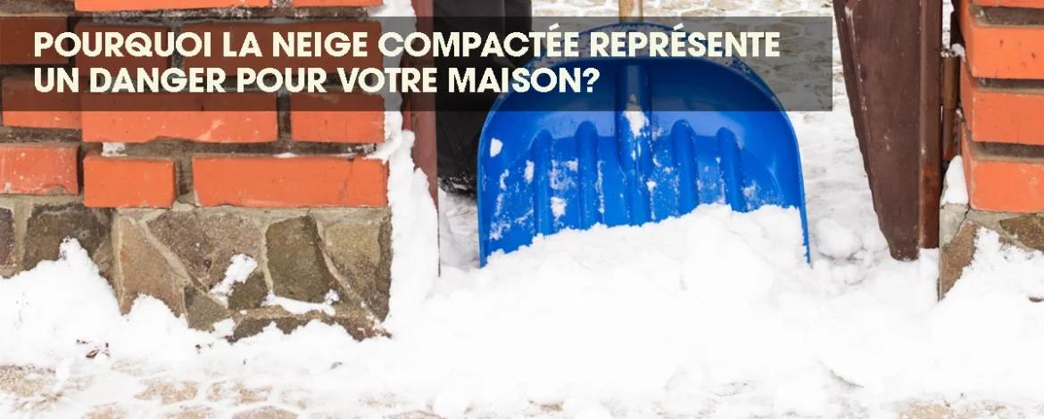 Man shoveling compacted snow from a home's entrance to prevent winter hazards.