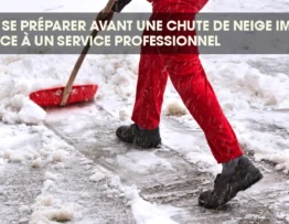 Man clearing snow from a residential driveway during winter